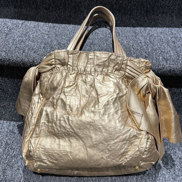 Prada gold leather bag with side bows! - Picture 5 of 17